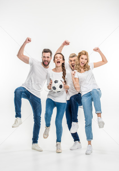 Cheerful friends with soccer ball Stock photo © LightFieldStudios