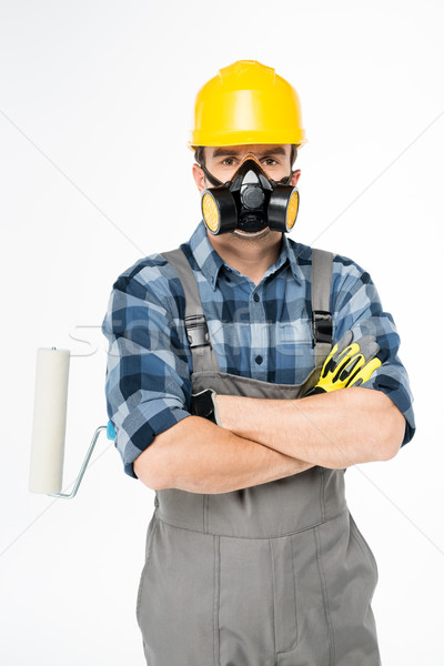 Stock photo: Workman with paint roller    