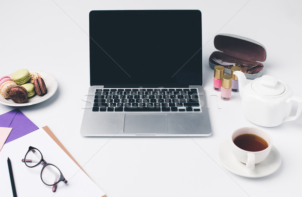 modern girly workplace with laptop Stock photo © LightFieldStudios