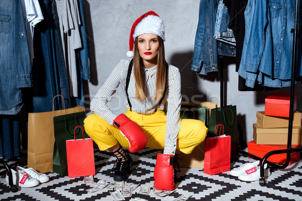 girl in santa hat in boutique Stock photo © LightFieldStudios