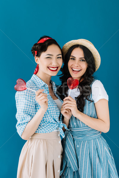 Multicultural mulheres retrato isolado azul comida Foto stock © LightFieldStudios
