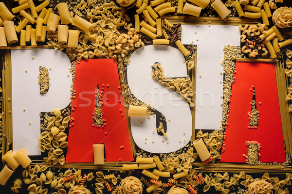 Macaroni vorm woord pasta teken Stockfoto © LightFieldStudios