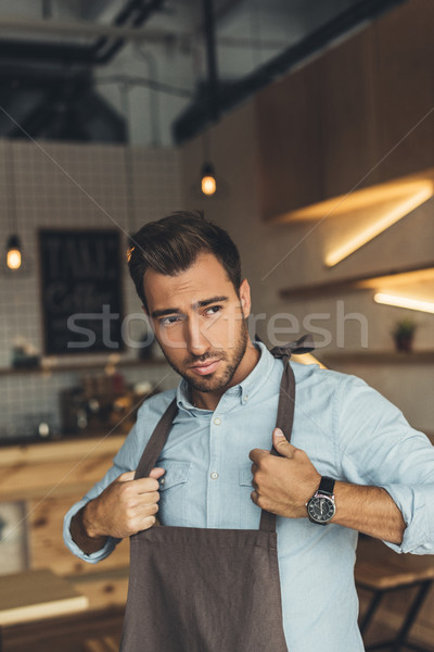 worker wearing apron Stock photo © LightFieldStudios