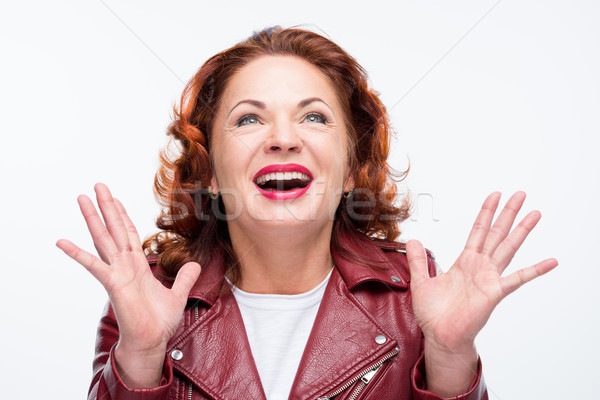 美麗 成熟的女人 興奮 皮夾克 白 商業照片 © LightFieldStudios