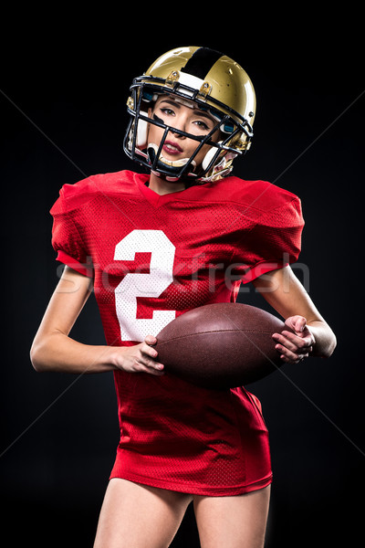 Female football player in helmet Stock photo © LightFieldStudios