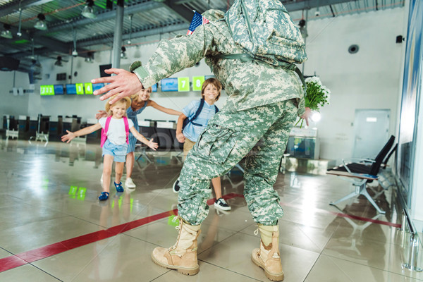 family meeting father in military uniform Stock photo © LightFieldStudios
