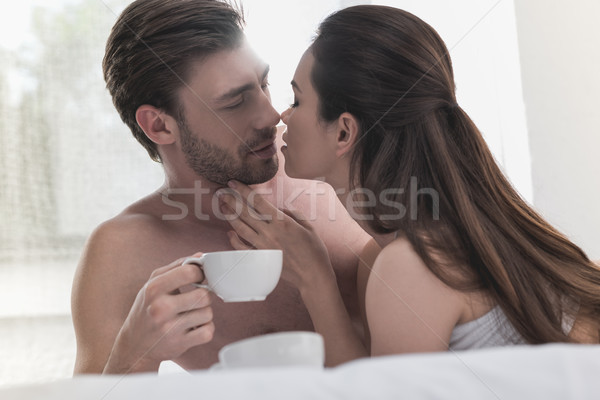 Paar drinken koffie bed portret sensueel Stockfoto © LightFieldStudios