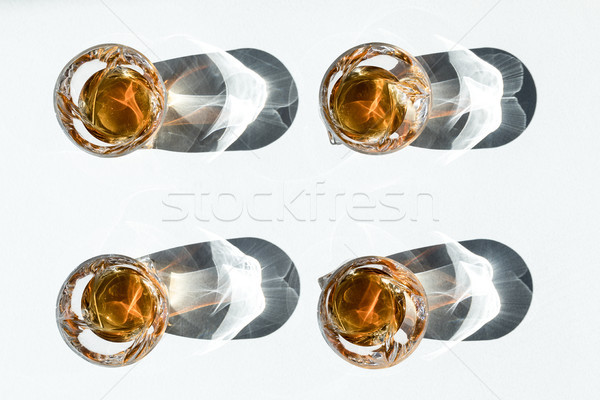 bourbon in glasses with shadows   Stock photo © LightFieldStudios