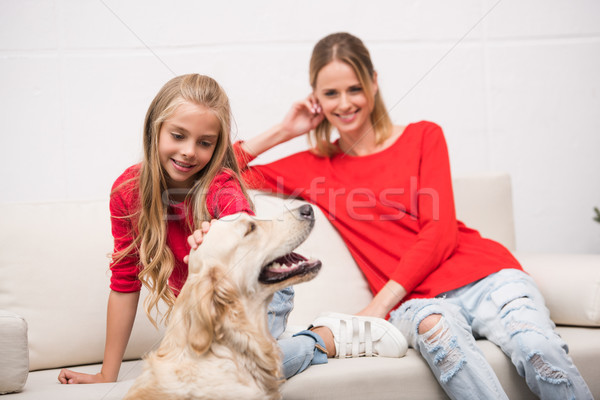 mother and daughter with dog Stock photo © LightFieldStudios