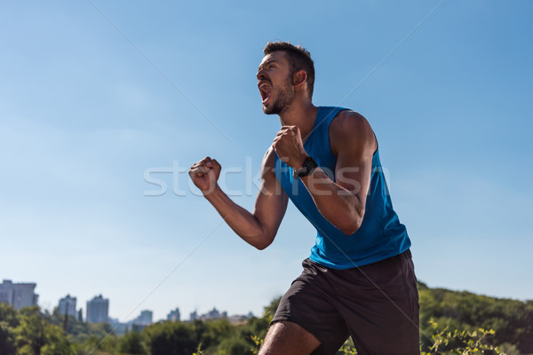 спортсмен триумф возбужденный Blue Sky Сток-фото © LightFieldStudios
