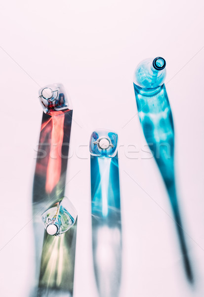 Colorido vidrio botellas superior vista tiro Foto stock © LightFieldStudios