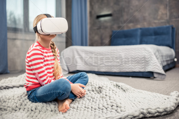 Girl in virtual reality headset Stock photo © LightFieldStudios