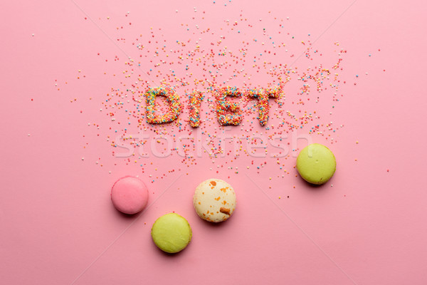 Top view of word diet made from candies isolated on pink, healthy lifestyle concept Stock photo © LightFieldStudios