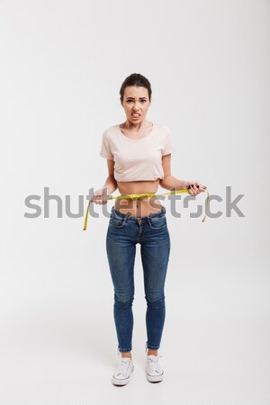 woman with shrug gesture Stock photo © LightFieldStudios