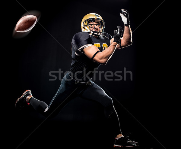 Futballista labda teljes alakos kilátás amerikai sportruha Stock fotó © LightFieldStudios