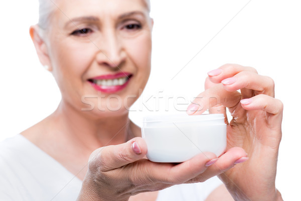 Senior volto di donna crema bella donna crema per il viso Foto d'archivio © LightFieldStudios