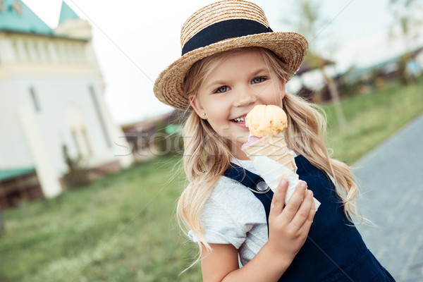 smiling child with ice cream Stock photo © LightFieldStudios