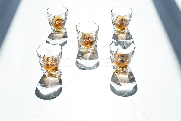 whiskey in glasses with shadows  Stock photo © LightFieldStudios