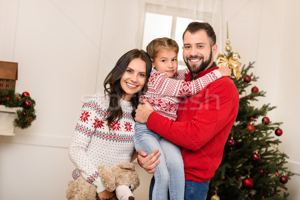 happy family with teddy bear at christmas Stock photo © LightFieldStudios