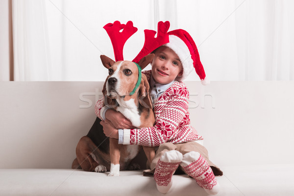 boy and his dog on christmas Stock photo © LightFieldStudios