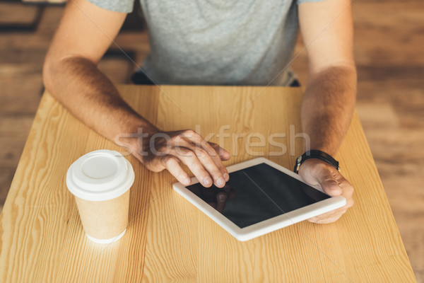 Stock photo: man using tablet in cafe