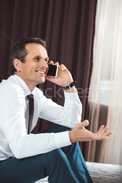 Businessman talking on phone Stock photo © LightFieldStudios