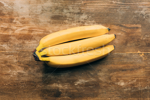 Bananes haut vue fraîches table en bois [[stock_photo]] © LightFieldStudios