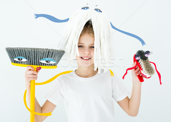 girl holding cleaning supplies Stock photo © LightFieldStudios