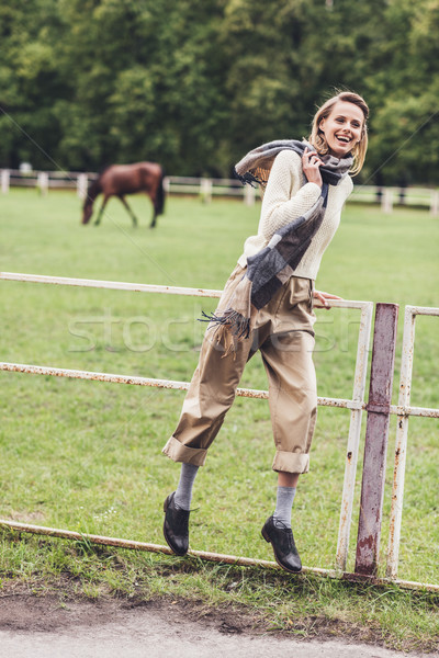 woman jumping at countryside Stock photo © LightFieldStudios