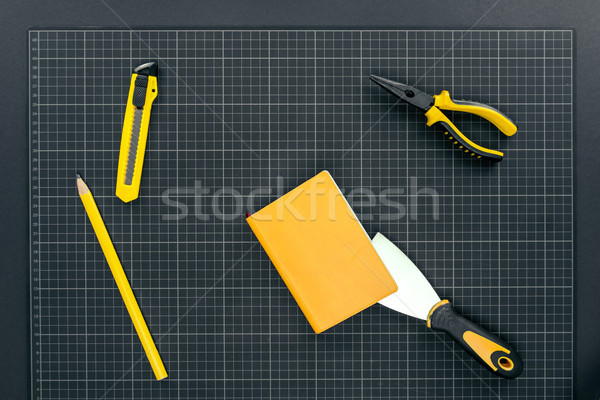 Notebook and tools on graph paper Stock photo © LightFieldStudios