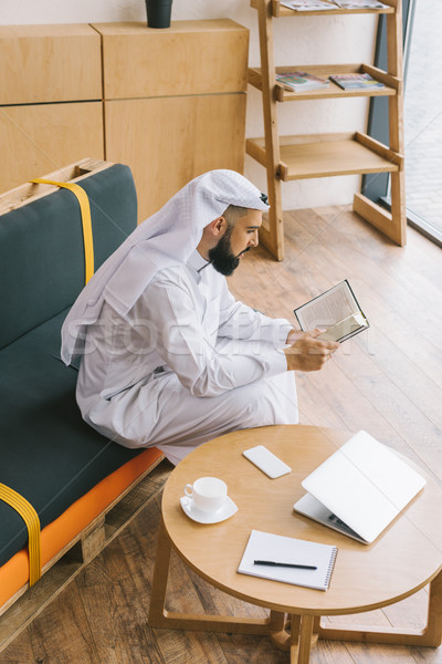 muslim man reading quran Stock photo © LightFieldStudios