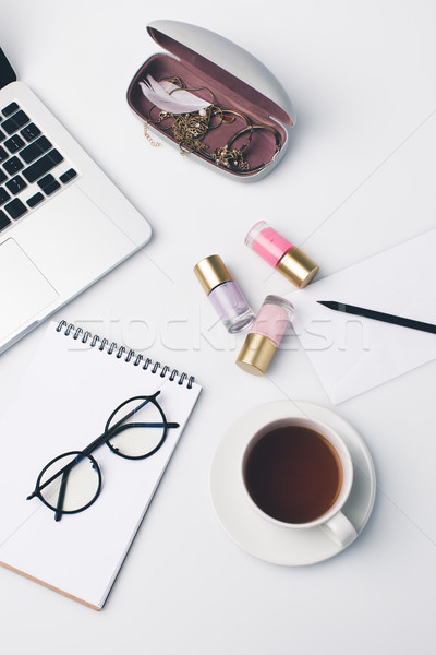 modern girly workplace with laptop Stock photo © LightFieldStudios