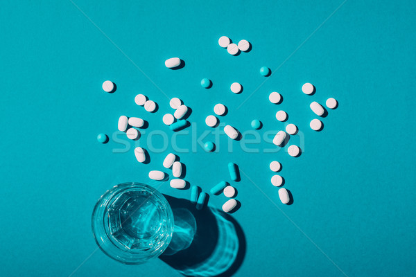 Stock fotó: Tabletták · üveg · víz · felső · kilátás · kék
