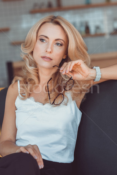 beautiful middle aged woman with eyeglasses Stock photo © LightFieldStudios