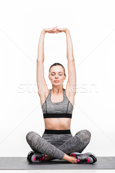 Stock photo: sporty girl meditating