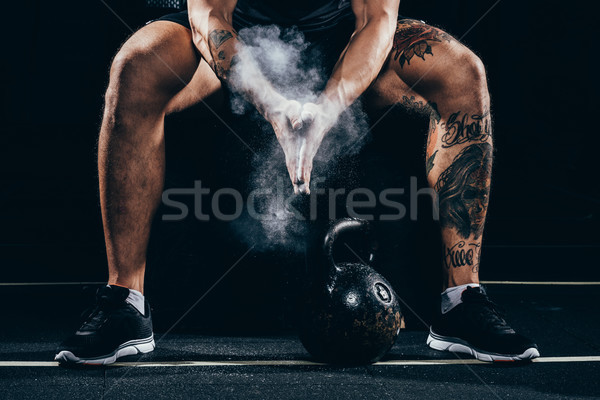 sportsman applying talcum to hands Stock photo © LightFieldStudios