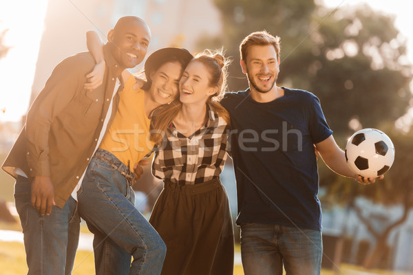 multicultural friends with soccer ball Stock photo © LightFieldStudios