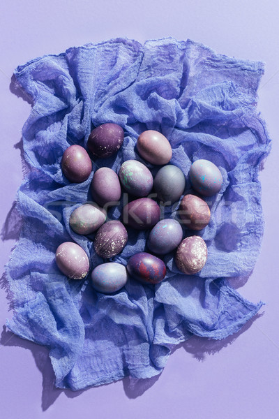 Felső kilátás húsvéti tojások lila étel boldog Stock fotó © LightFieldStudios