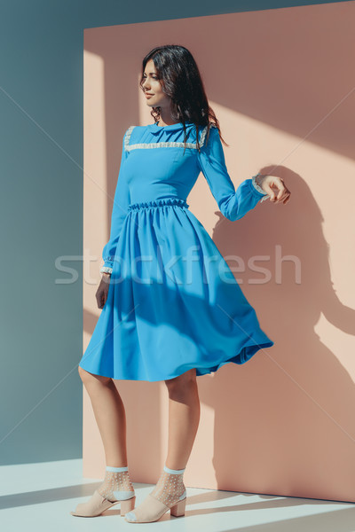 Stock photo: Woman in fashionable turquoise dress