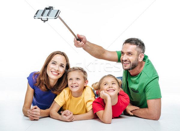 Happy family taking selfie   Stock photo © LightFieldStudios