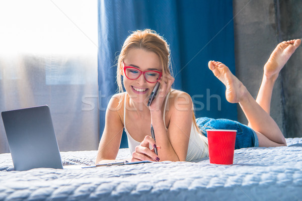 Girl talking on smartphone    Stock photo © LightFieldStudios