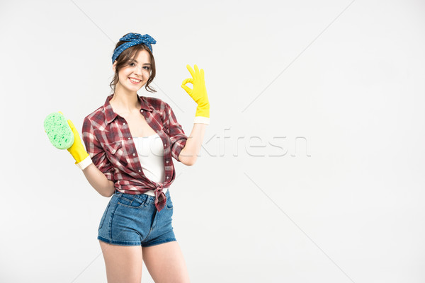 Young woman with sponge Stock photo © LightFieldStudios