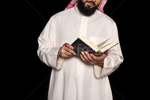 muslim man reading quran Stock photo © LightFieldStudios