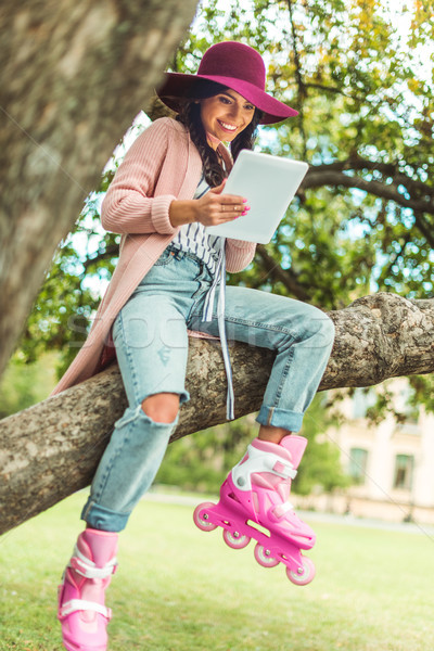 girl with digital tablet in park Stock photo © LightFieldStudios