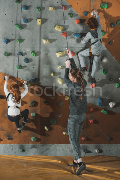 two little kids climbing wall Stock photo © LightFieldStudios