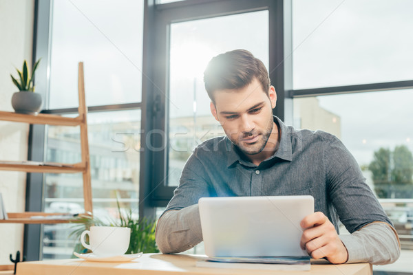 Stock photo: man using laptop