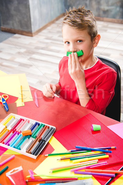 Schoolchild playing with plasticine Stock photo © LightFieldStudios