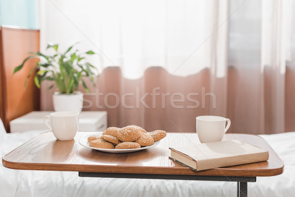 Cookies libro ospedale stanza coppe tavola Foto d'archivio © LightFieldStudios
