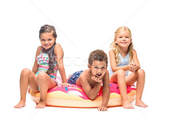 multiethnic kids on swim tube  Stock photo © LightFieldStudios