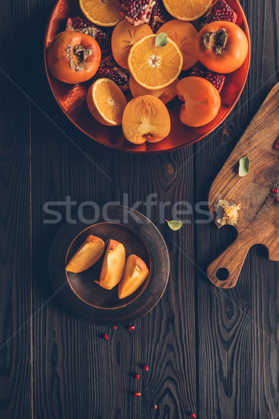 Felső kilátás gyümölcsök fa deszka asztal textúra Stock fotó © LightFieldStudios
